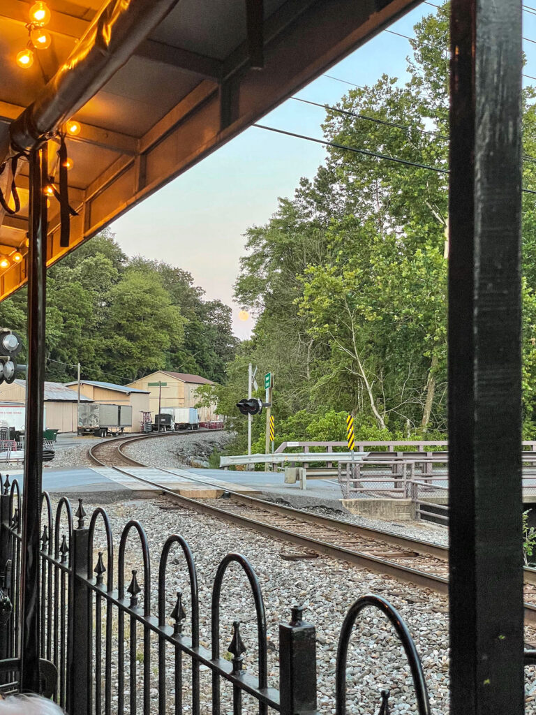 If you're lucky, you'll catch a freight train while dining outside at Sykesville Station